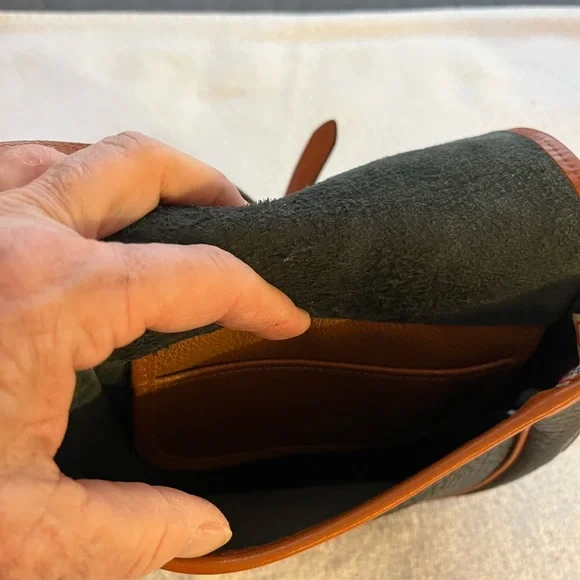 Dooney & Bourke All Weather Leather Black & Tan Saddle Crossbody Bag. - Picture 4 of 9